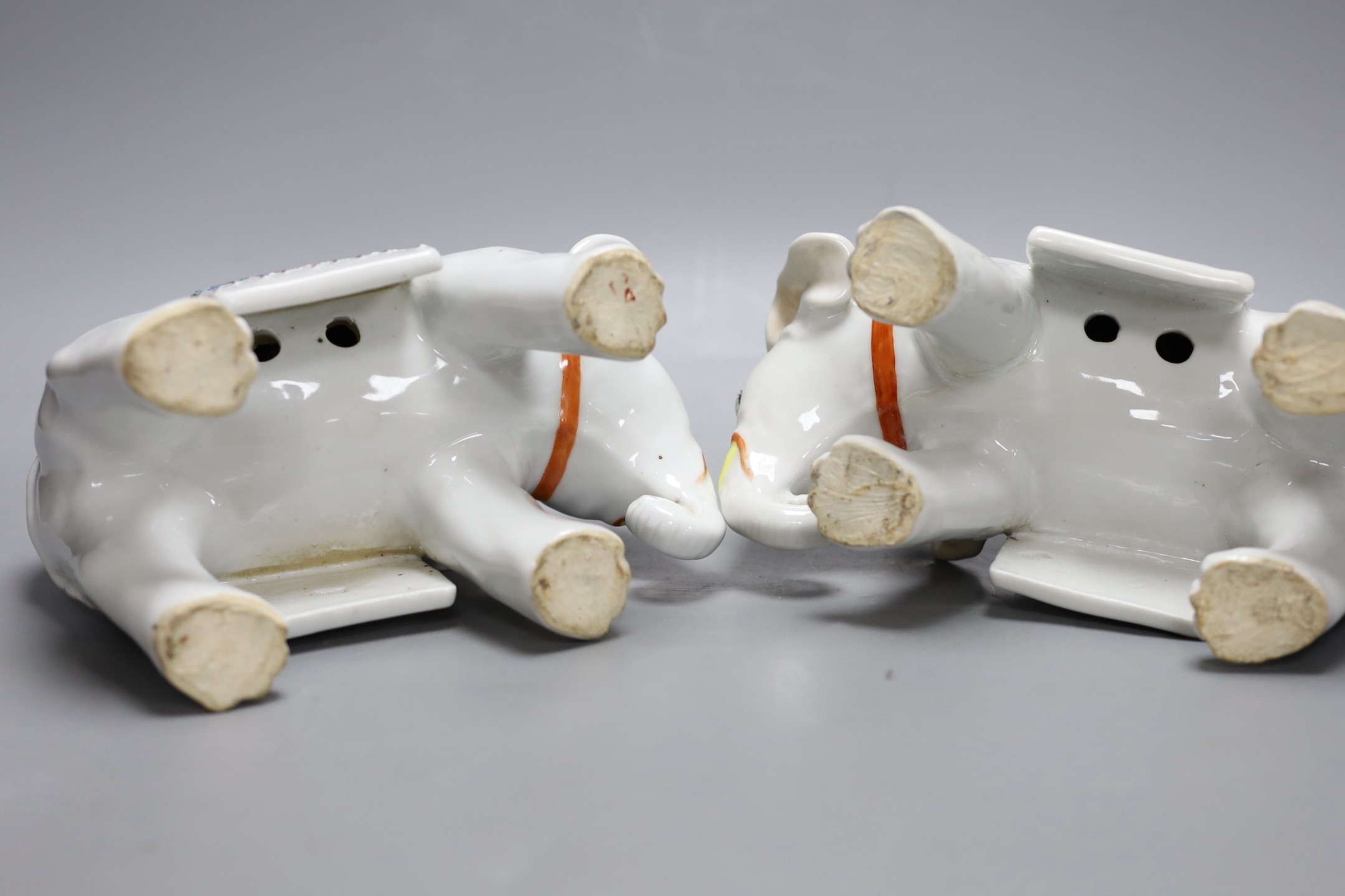 A pair of Chinese enamelled porcelain ‘elephant’ vases, 27cm high